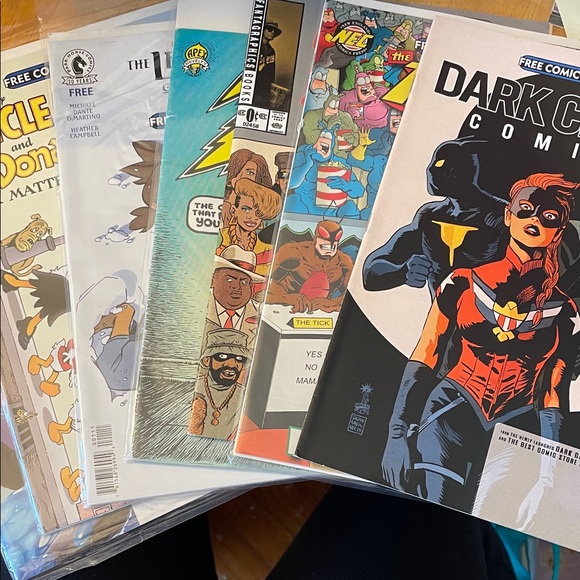 Comic Book Collection with Colorful Covers - Picture 1 of 8